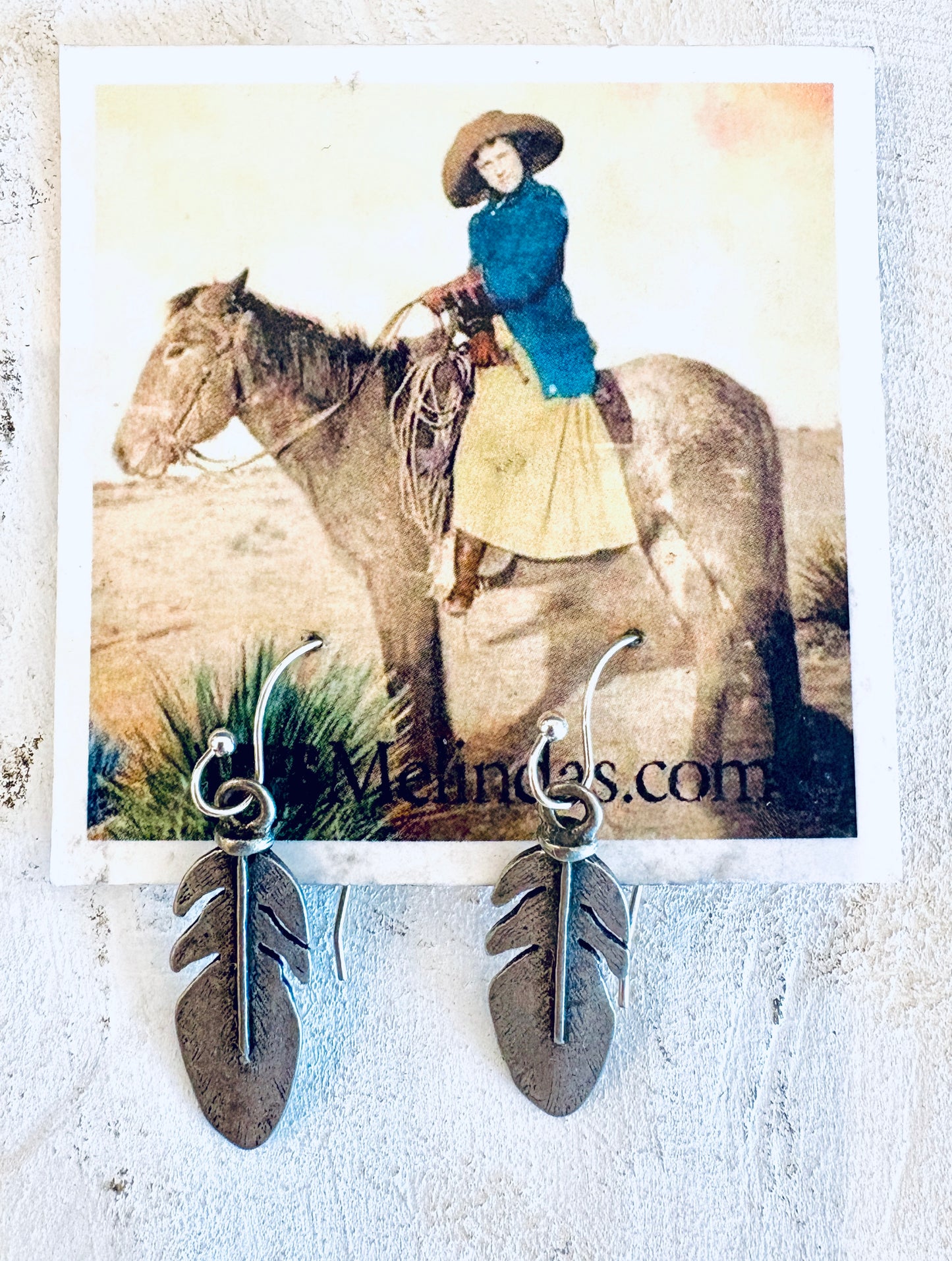 Tres Melindas: Feather Earrings