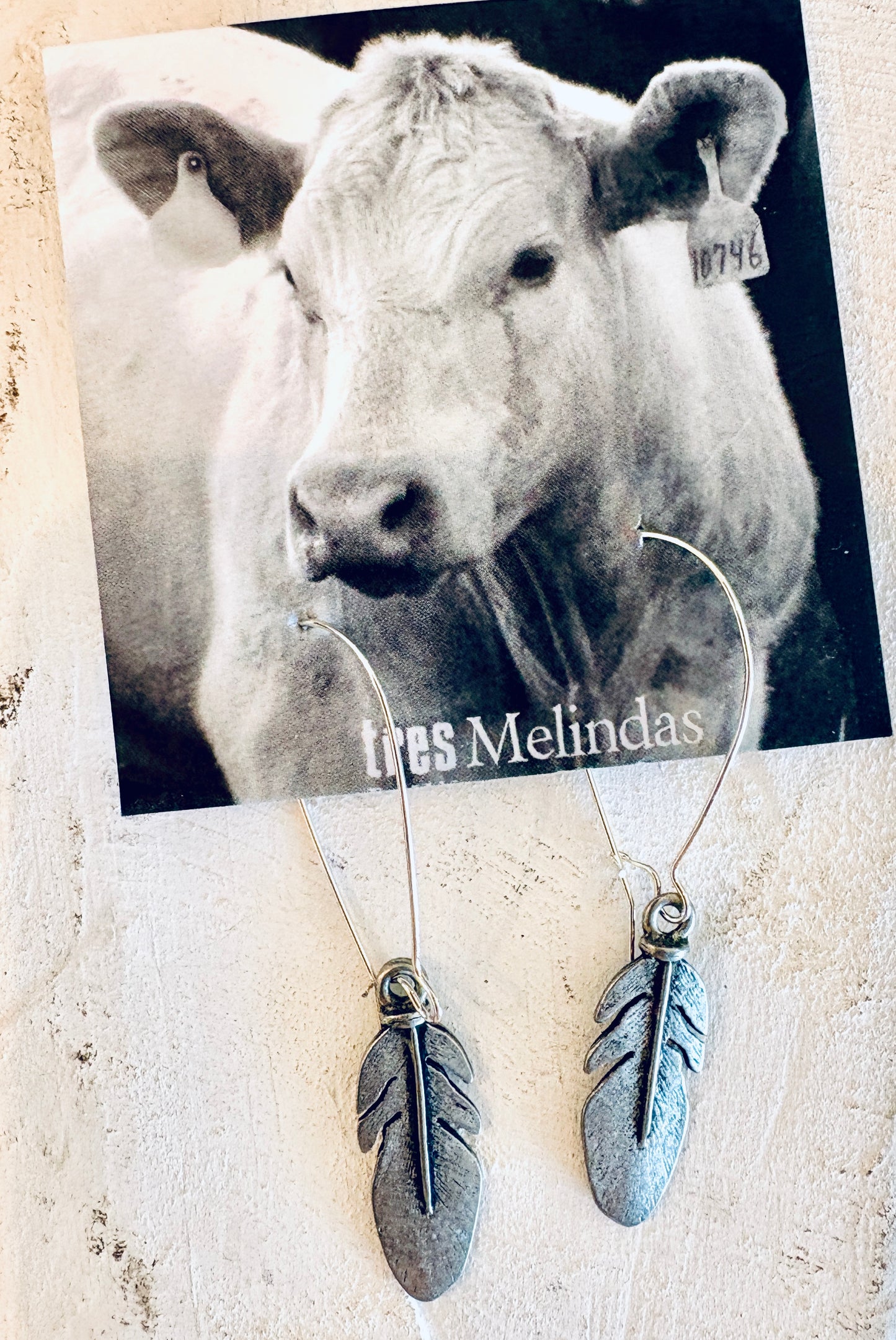 Tres Melindas: Feather Earrings