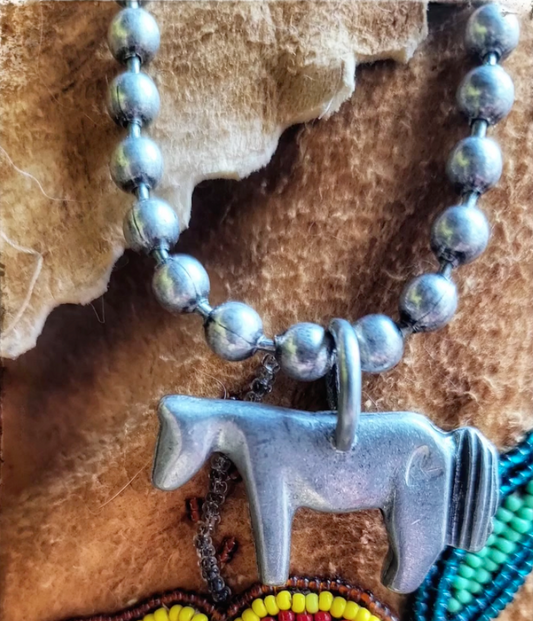 Tres Melindas: Cupid Fetish Horse Necklace